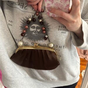 Elegant Brown Clutch with Pearl Accents